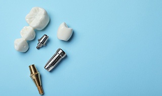 parts of dental implants with a blue background