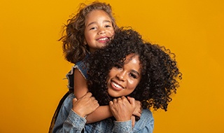 Mom and daughter after tooth-colored filling in Marlton