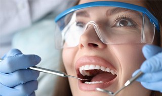 Patient visiting dentist in Marlton 