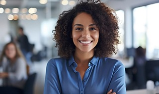 a smiling business woman in an office