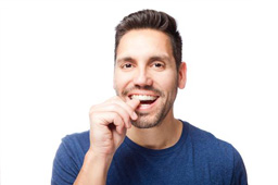 Man placing Invisalign tray