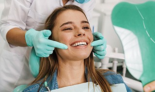 Woman smiling at the dentist