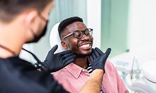 Man smiling in the dental chair