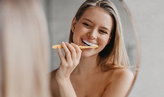 Woman brushing her teeth