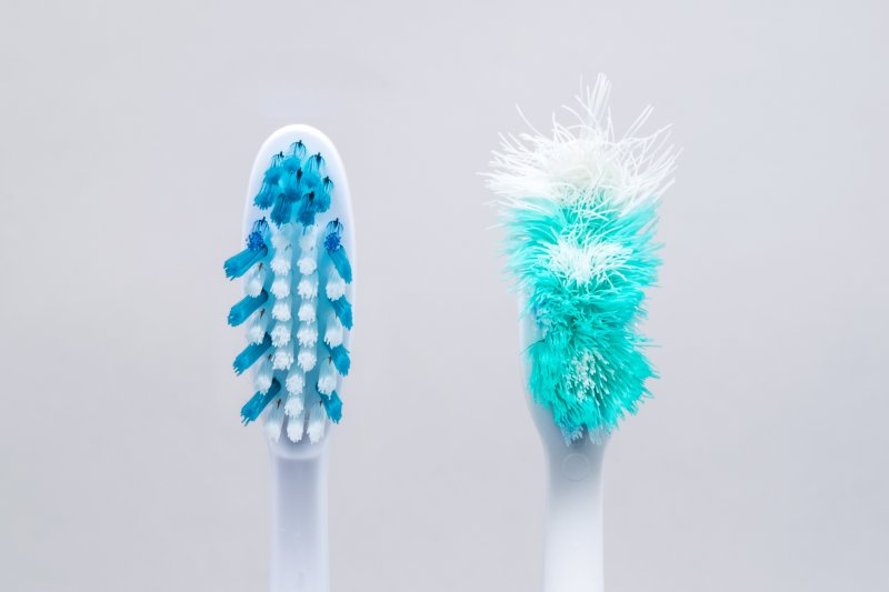 Image of old toothbrush and new toothbrush