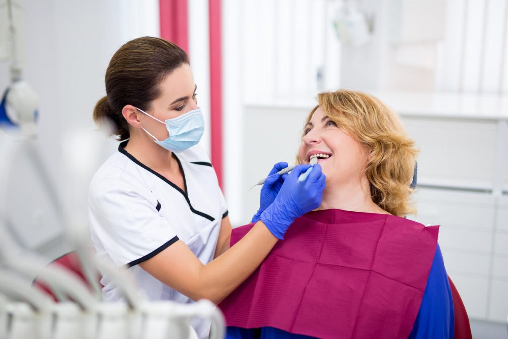 patient getting a dental checkup and cleaning in Marlton