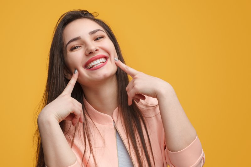 Woman shows off smile